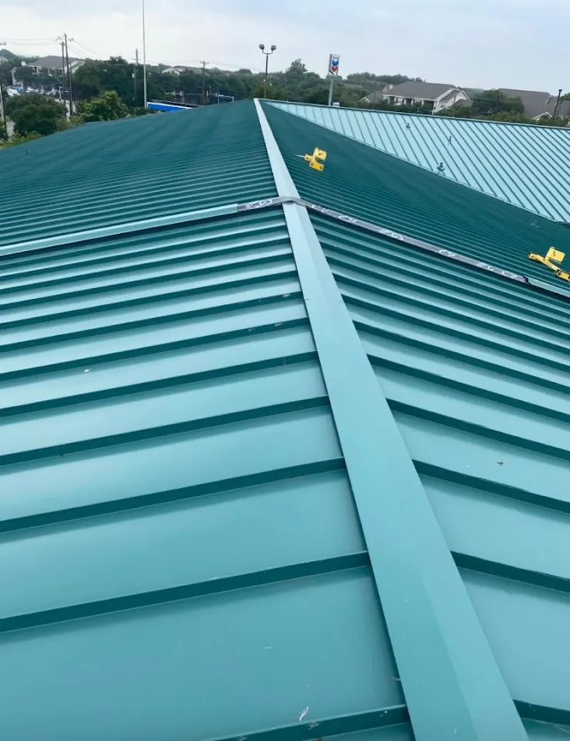 Green commercial metal roof ridge and valley for Metal Roof Repair in Gulf Hills