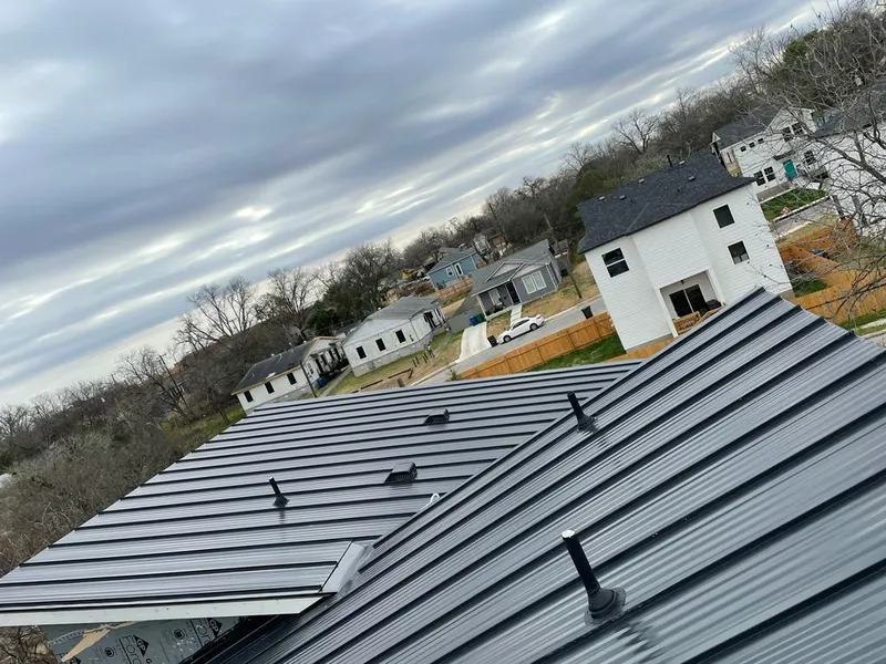 Standing seam metal roof panels with vents for Skylight Repair in Gulf Hills